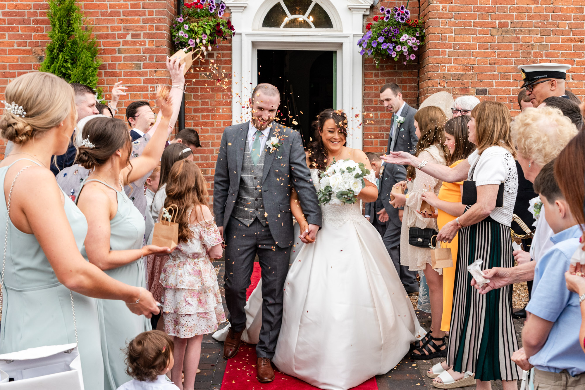 Bride and Groom confetti walkthrough at The Barns Hotel Cannock