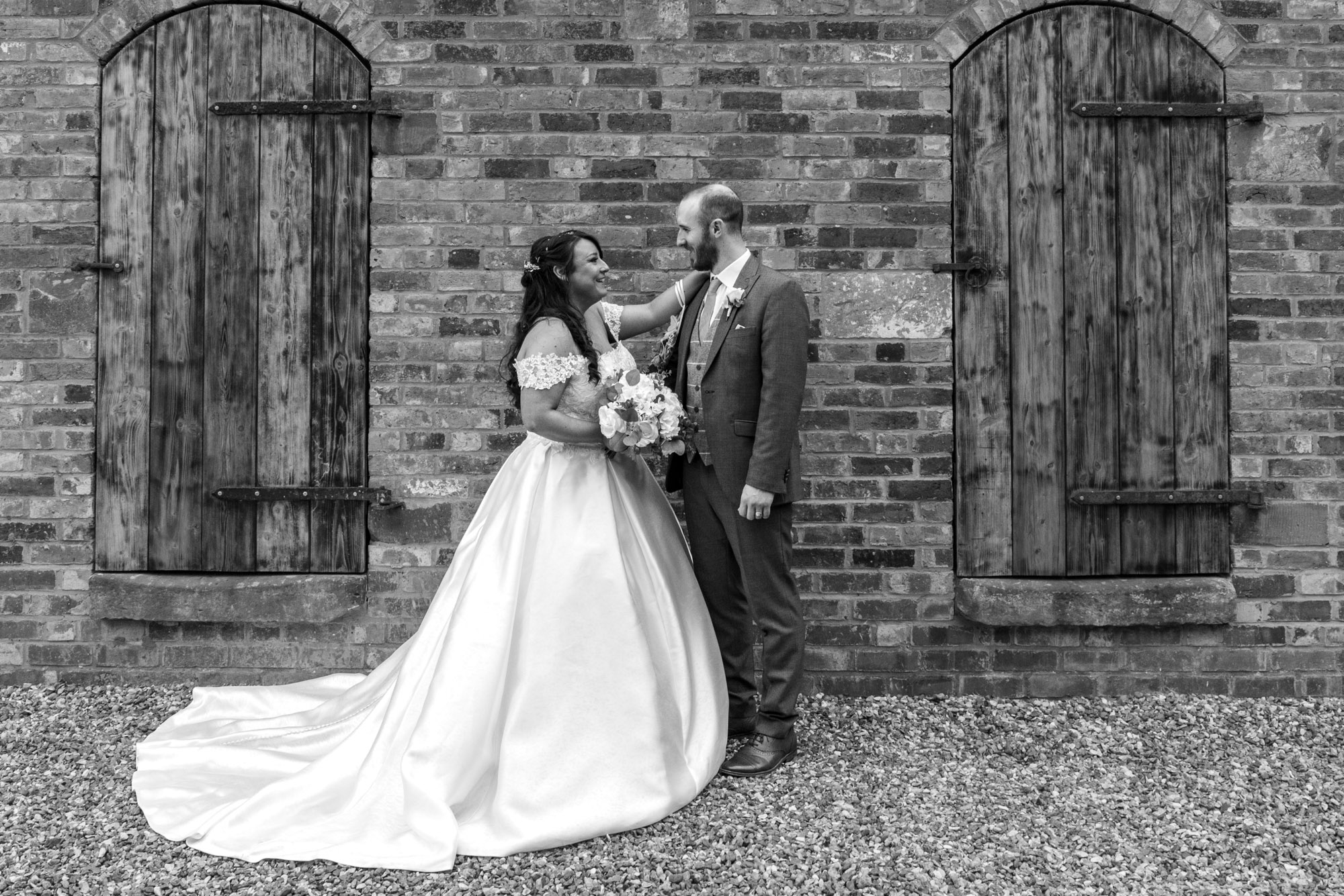 Bride and Groom outside The Barns Hotel Cannock